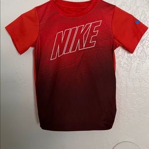 Kids Orange Nike Dri-Fit shirt